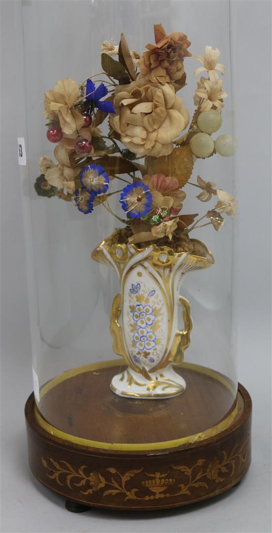 A marriage glass domed flower display on inlaid base